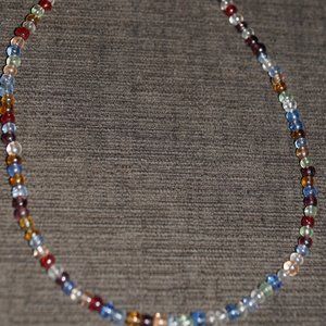 Multi colored glass beaded 16" strand